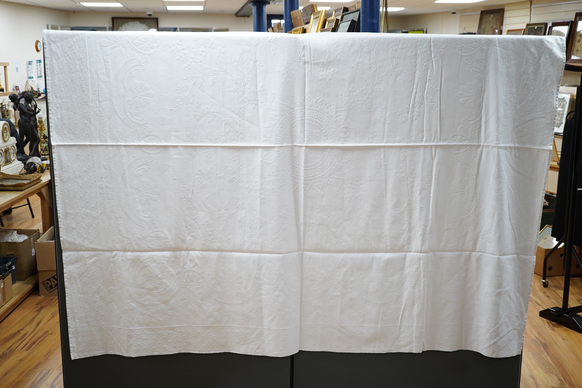 Three late 19th century white linen ‘Marcella’ style bedcovers, with inspired Christopher Dresser floral textile designs.